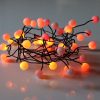 Sunset® Berry Cluster Lights on Black Wire. 40 LEDs, a combination of Red, Orange and Yellow lights. Battery operated Garland Fairy Lights with Timer