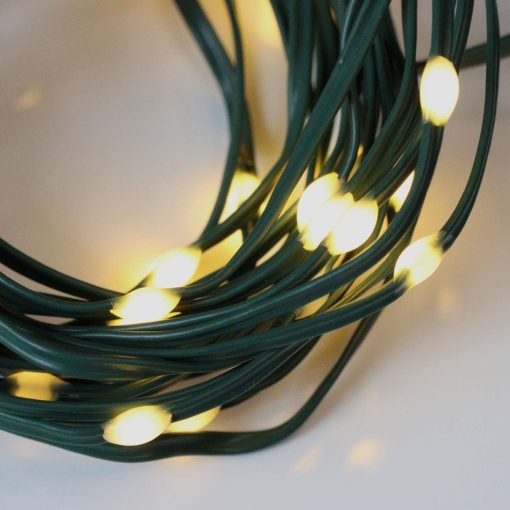 60 Warm White Battery Powered Fairy Lights on Green Wire. Multifunction with Timer