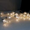 Indoor mini festoon lights with 16 Warm White LEDs on Clear Cable. Battery powered fairy lights with timer