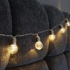 Indoor mini festoon lights with 16 Warm White LEDs on Clear Cable. Battery powered fairy lights with timer